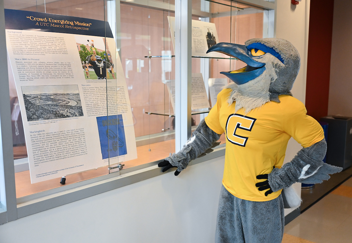 Scrappy visits the UTC exhibition on the history of mascots. Photo by Angela Foster.