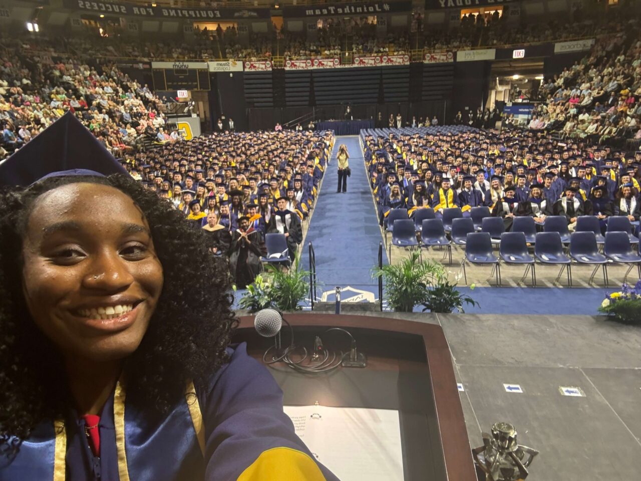 Following her remarks to UTC students of the Gary W. Rollins College of Business and the College of Health, Education and Professional Studies at the afternoon May 4 commencement, Student Government Association President Chamyra Teasley took a selfie with the graduates. Photo courtesy of Chamyra Teasley.