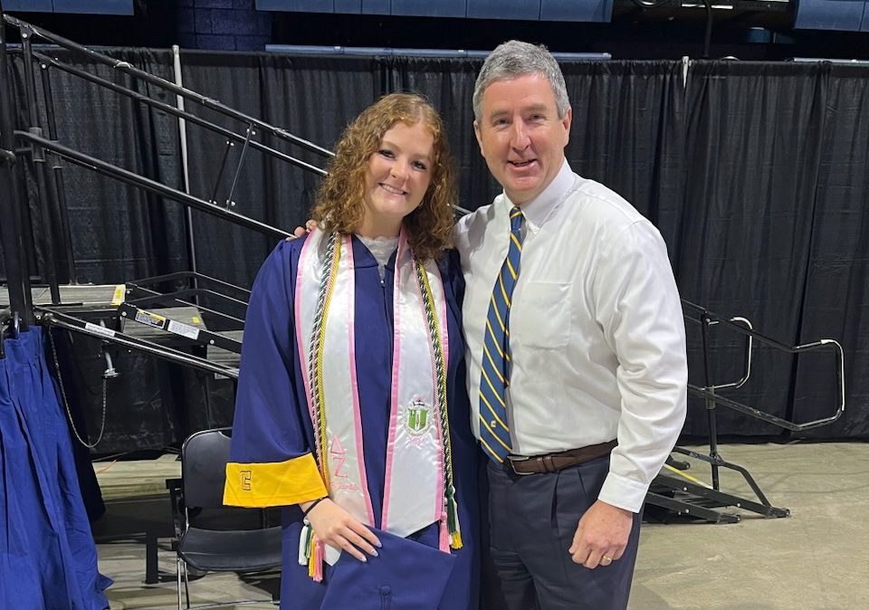 Graduate Caroline Dale and her father, Jay. Photo by Lane Gutridge.