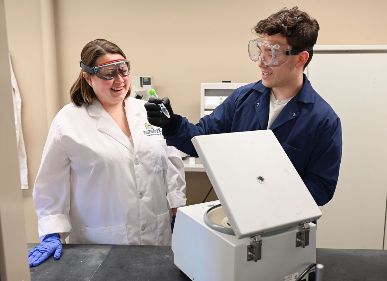 Dr. Meredith Barbee and Chase Matusek work together in the lab at UTC. Photo credit: Angela Foster. 