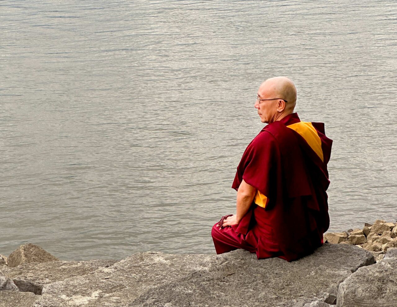 During his visit to Chattanooga, Lobsang Samten—a Tibetan-born monk who runs Buddhist teaching centers in Canada—spent time at the Tennessee River. Photo courtesy of Dr. Les Kertay.