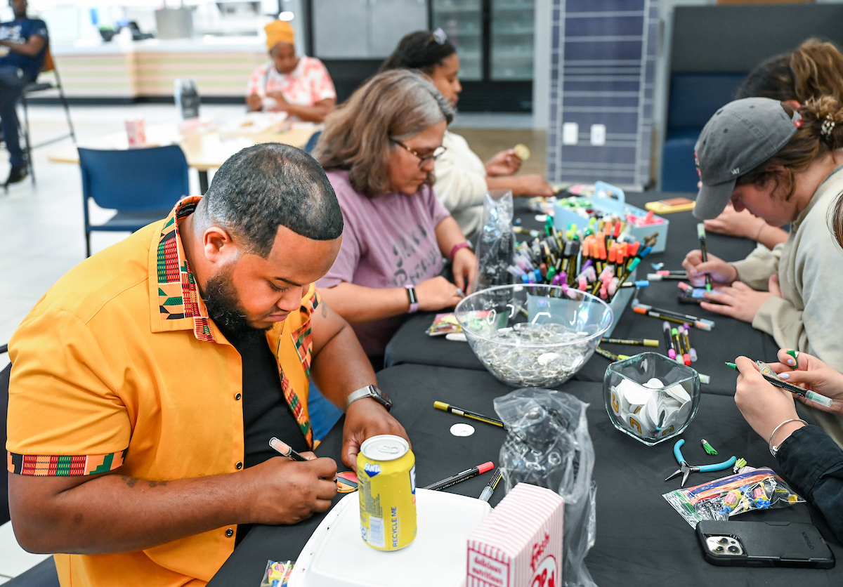 Staff, faculty, students and summer program members participate Friday, June 14, 2024 in a Juneteenth celebration in Lupton Hall.
