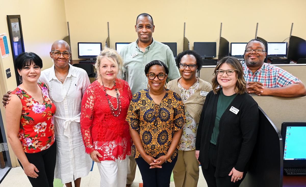 The staff of the Educational Opportunity Center works Thursday, July 18, in their office on the Chattanooga State Community College campus. From left: Tannaz Salehkhou,, Zennia Nesmith, Donna Taheri, Dr. Keith Bridges, Vice Chancellor Stacy Lightfoot, Kimberly Davis, Esther Johnson and Robert Rooks. Photo by Angela Foster.