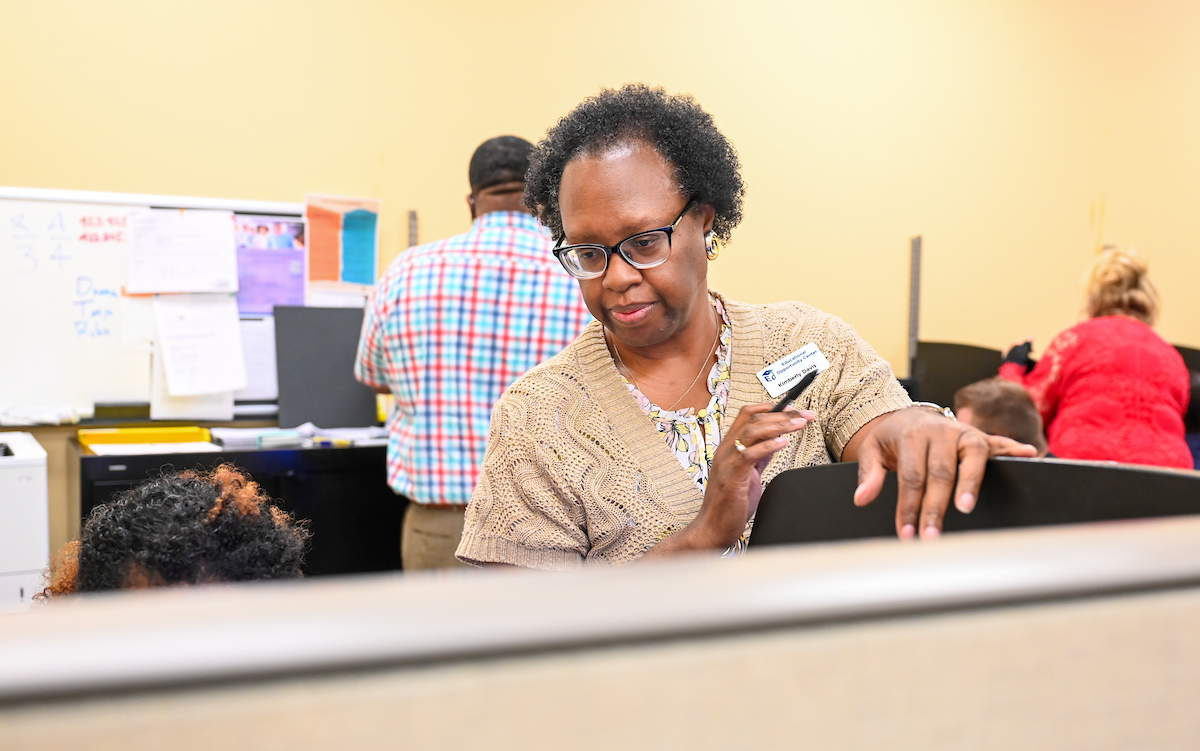 The staff of the Educational Opportunity Center works Thursday, July 18, 2024 in their office on the Chattanooga State Community College campus.