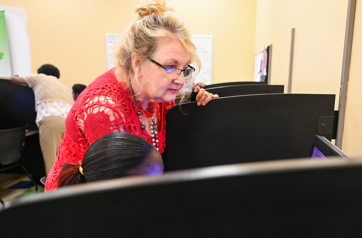 The staff of the Educational Opportunity Center works Thursday, July 18, 2024 in their office on the Chattanooga State Community College campus.