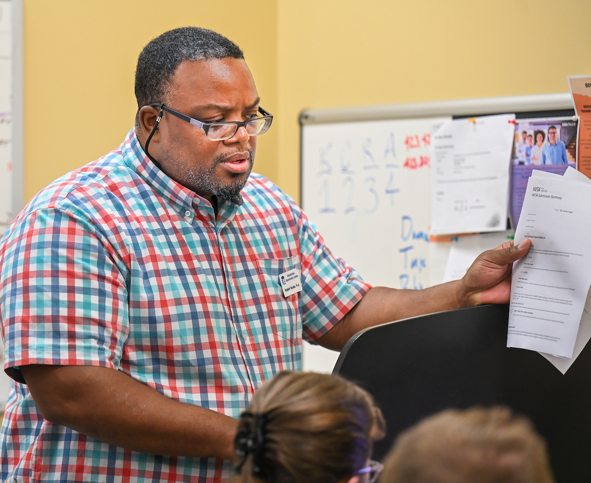 The staff of the Educational Opportunity Center works Thursday, July 18, 2024 in their office on the Chattanooga State Community College campus.