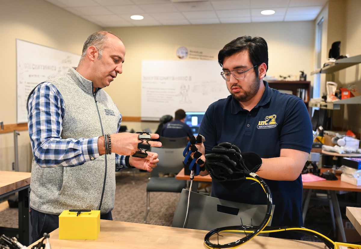 Juan Pena and Erkan Kaplanoglu talk Tuesday, April 2, 2024 about a project that they are working on.