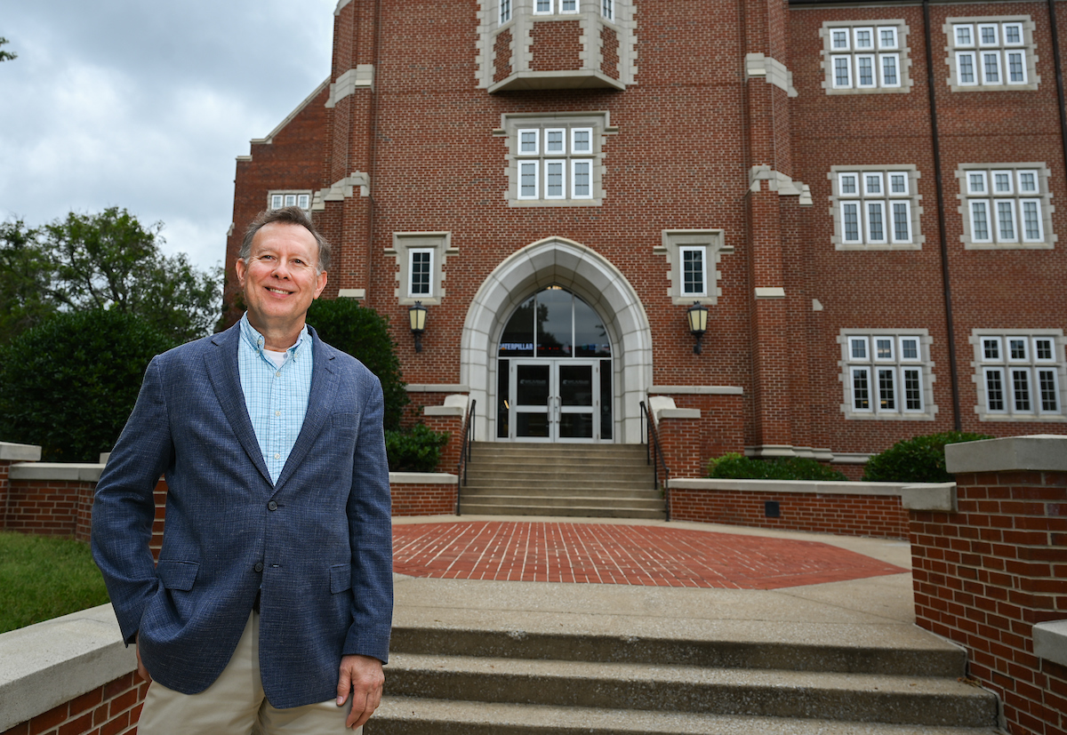 Dr. David Witt stands outside of Fletcher Hall. Witt is an associate lecturer of marketing and entrepreneurship in the Gary W. Rollins College of Business. Photo by Angela Foster.