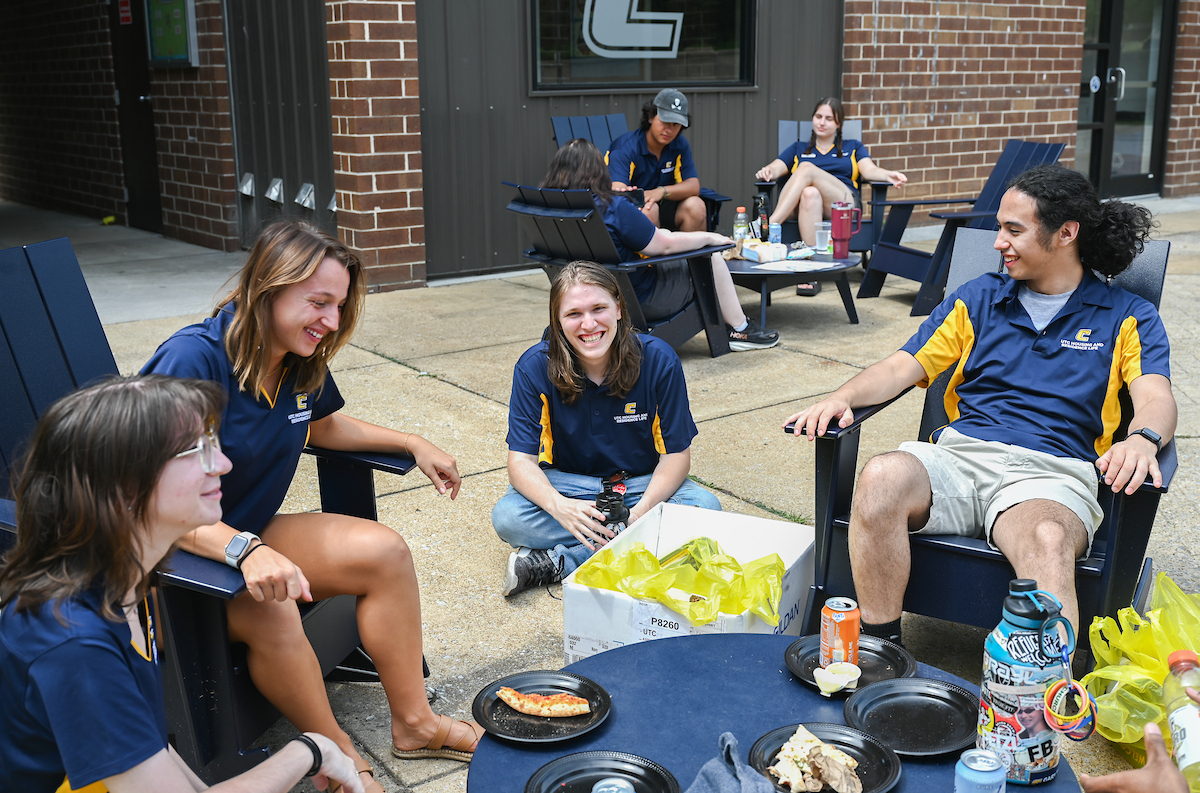 Housing and Residence Life employees sit, Monday, Aug. 12, 2024 outside of Lockmiller.