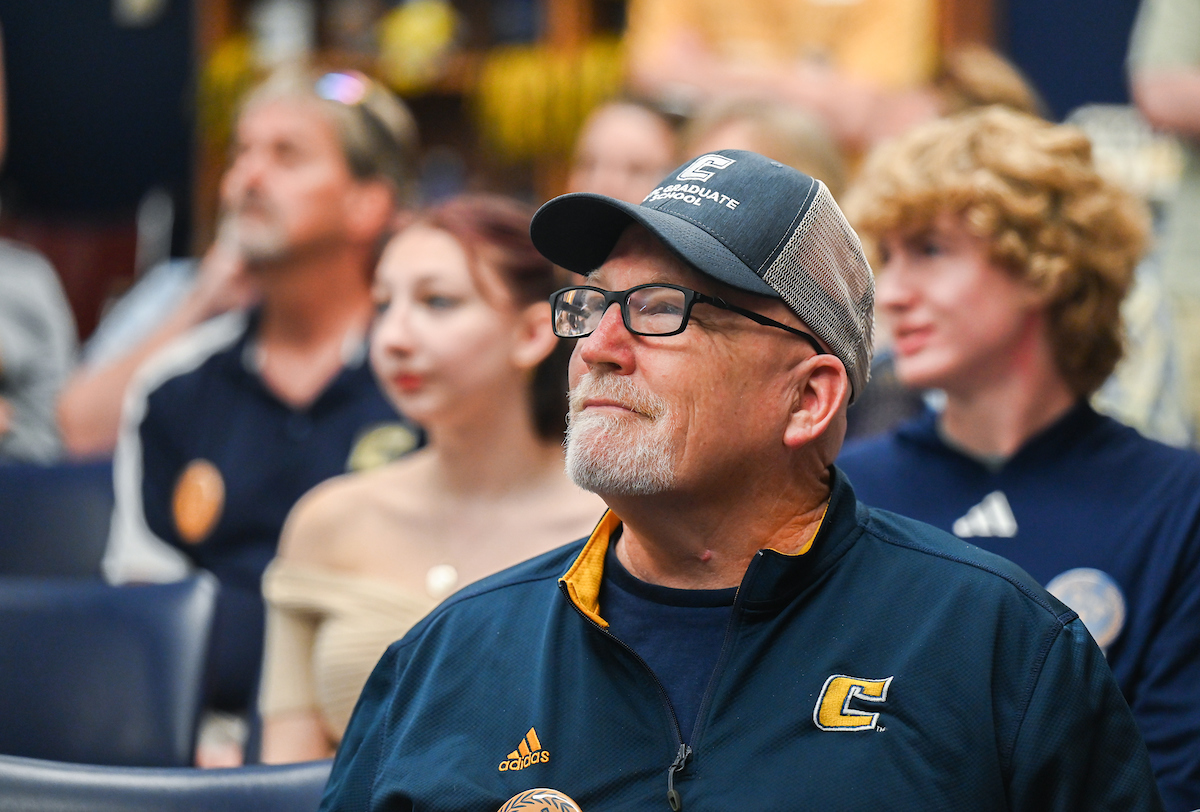 Staff, faculty and students gather Friday, Aug. 9, 2024 in the University Center to watch student Olivia Reeves compete for gold in the Olympics snatch and clean and jerk weightlifting event.