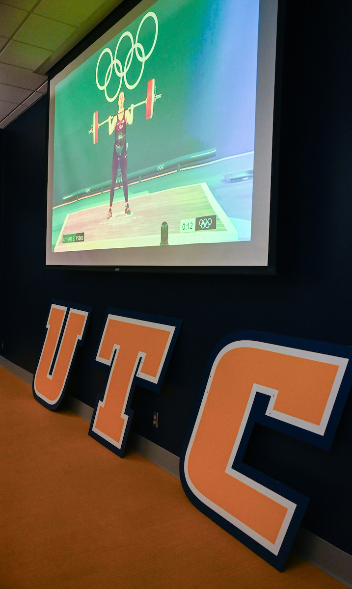 Staff, faculty and students gather Friday, Aug. 9, 2024 in the University Center to watch student Olivia Reeves compete for gold in the Olympics snatch and clean and jerk weightlifting event.