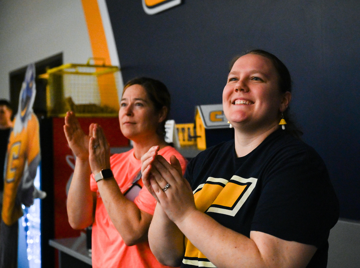 Staff, faculty and students gather Friday, Aug. 9, 2024 in the University Center to watch student Olivia Reeves compete for gold in the Olympics snatch and clean and jerk weightlifting event.
