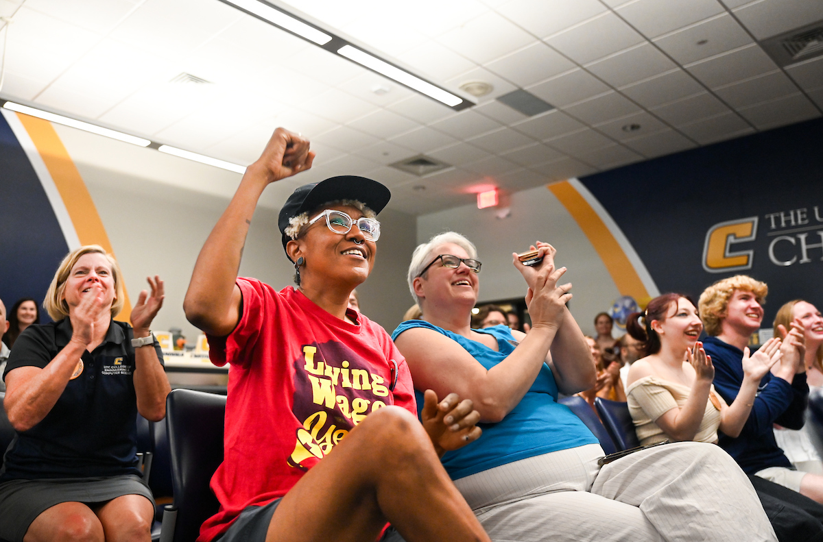 Staff, faculty and students gather Friday, Aug. 9, 2024 in the University Center to watch student Olivia Reeves compete for gold in the Olympics snatch and clean and jerk weightlifting event.