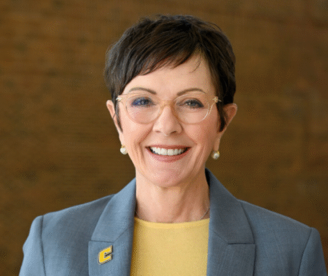 Kim White smiles for the camera