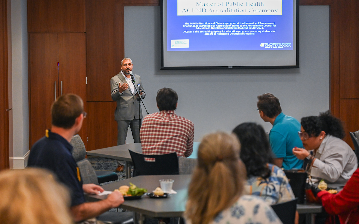 MPH Program Director Amir Alakaam gives remarks at the accreditation ceremony on Wednesday, Sept. 4.