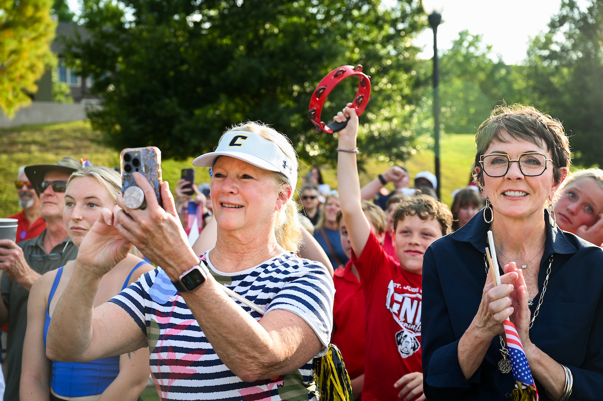 People watch a parade Tuesday, Sept. 3, 2024 to honor UTC student and Olympic Gold medalist Olivia Reeves.