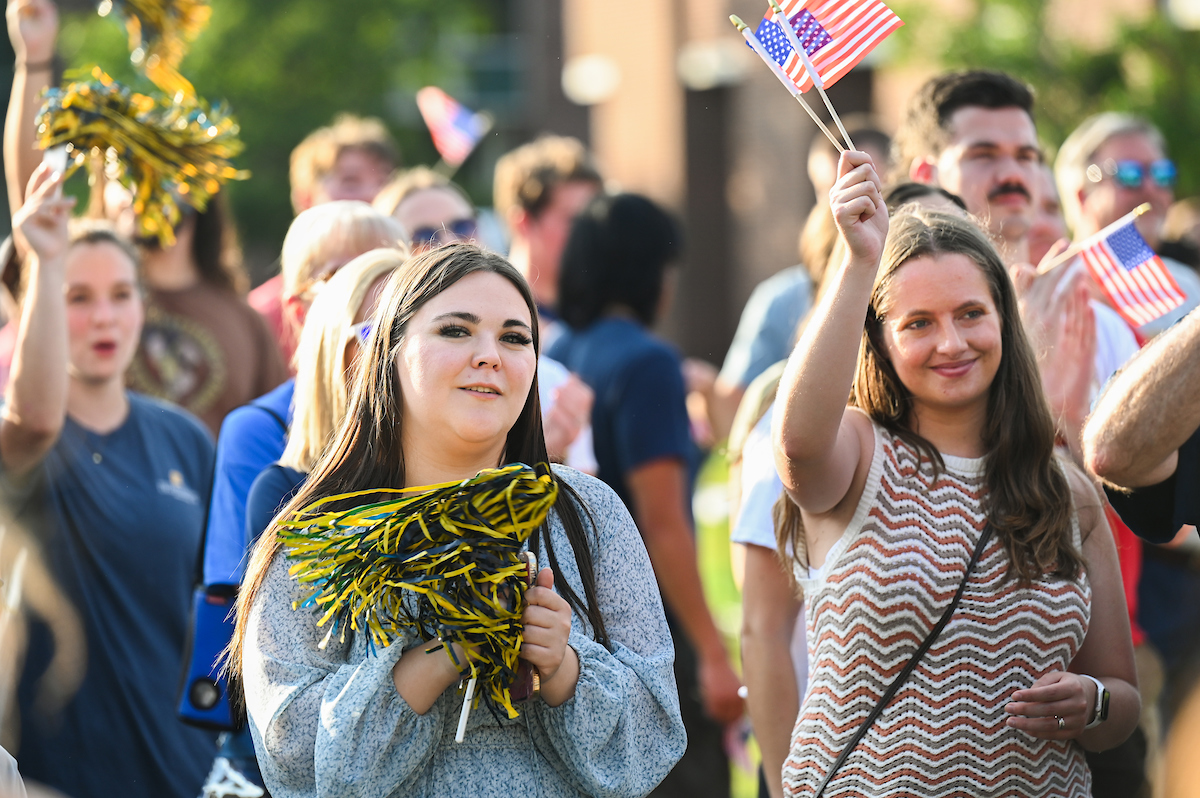 People watch a parade Tuesday, Sept. 3, 2024 to honor UTC student and Olympic Gold medalist Olivia Reeves.