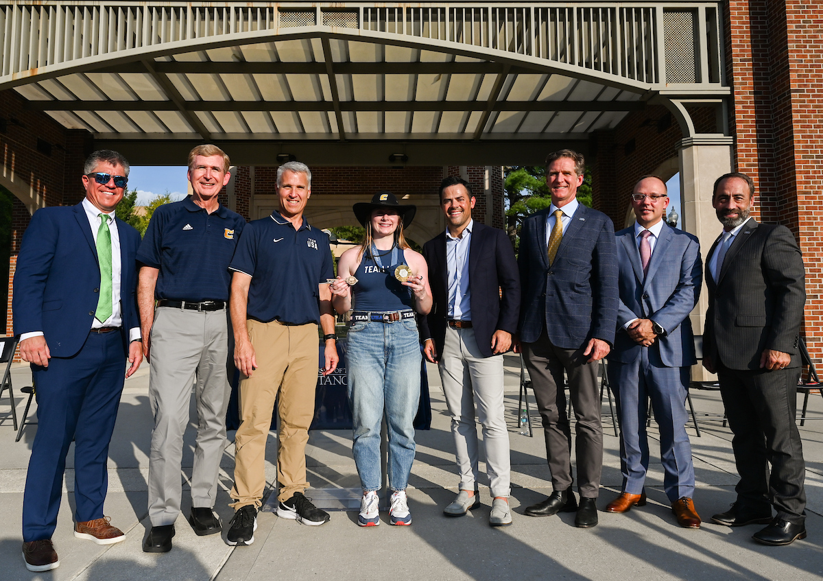People watch a parade Tuesday, Sept. 3, 2024 to honor UTC student and Olympic Gold medalist Olivia Reeves.