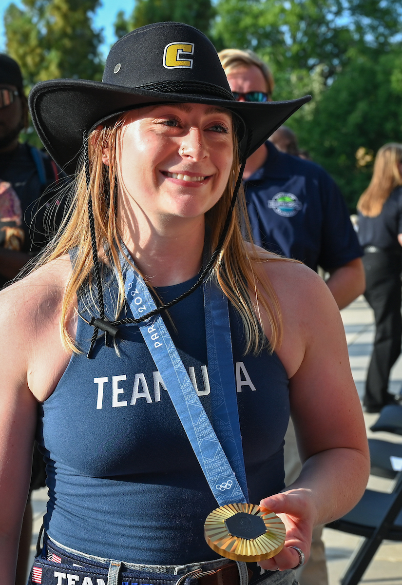 People watch a parade Tuesday, Sept. 3, 2024 to honor UTC student and Olympic Gold medalist Olivia Reeves.