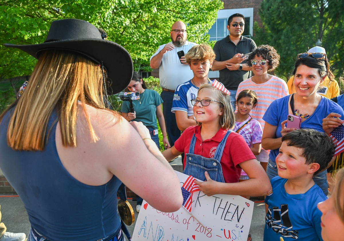 People watch a parade Tuesday, Sept. 3, 2024 to honor UTC student and Olympic Gold medalist Olivia Reeves.