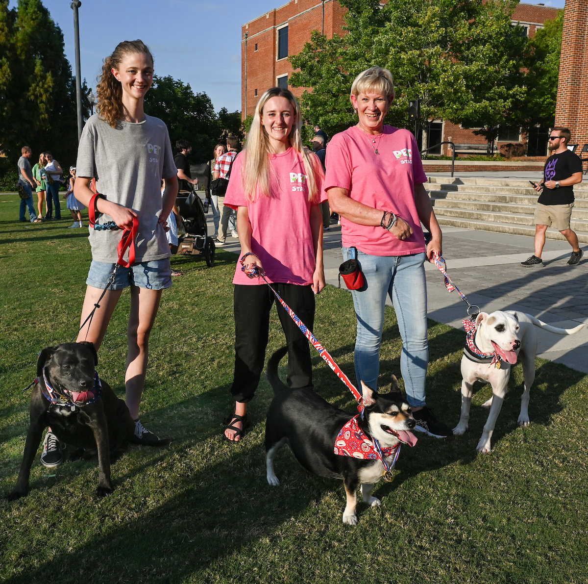 People watch a parade Tuesday, Sept. 3, 2024 to honor UTC student and Olympic Gold medalist Olivia Reeves.