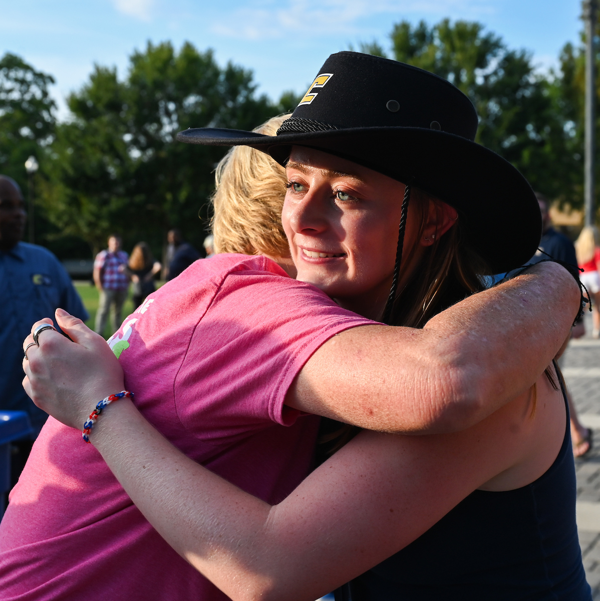 People watch a parade Tuesday, Sept. 3, 2024 to honor UTC student and Olympic Gold medalist Olivia Reeves.