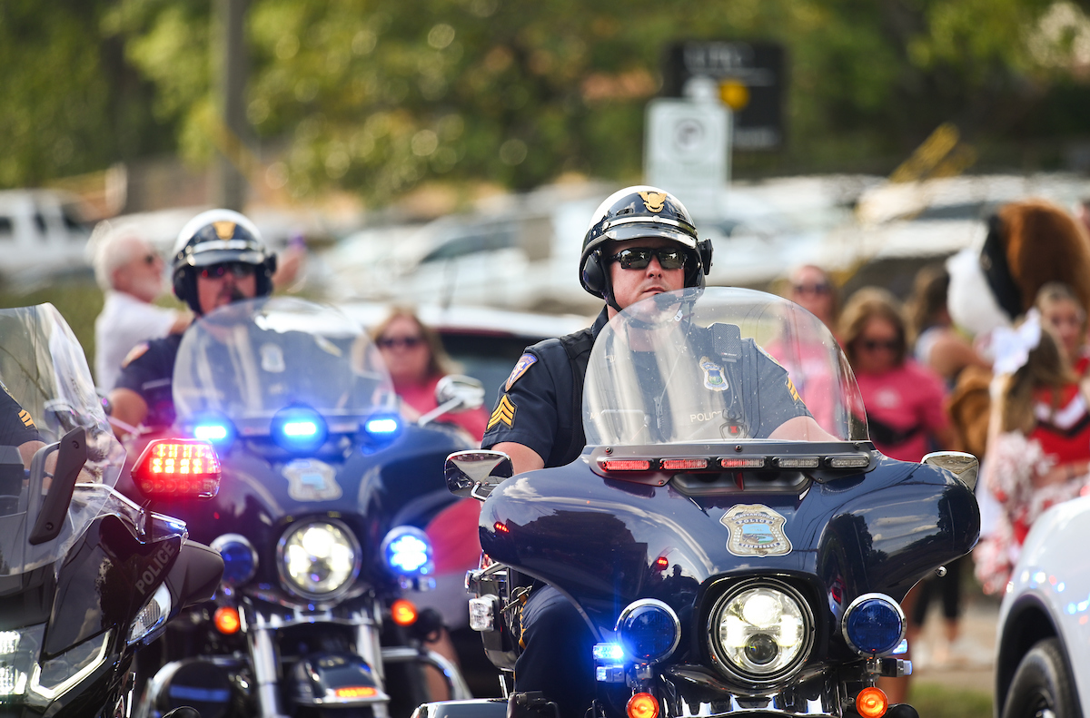 People watch a parade Tuesday, Sept. 3, 2024 to honor UTC student and Olympic Gold medalist Olivia Reeves.