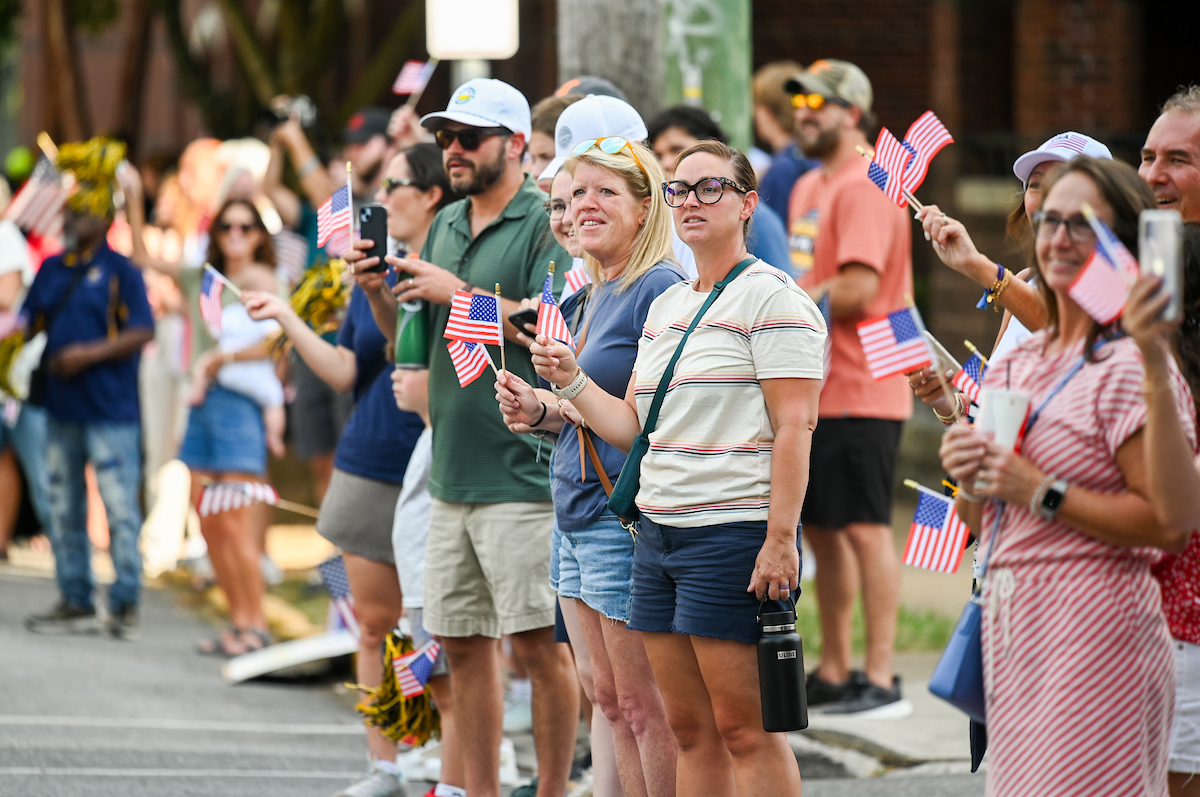 People watch a parade Tuesday, Sept. 3, 2024 to honor UTC student and Olympic Gold medalist Olivia Reeves.