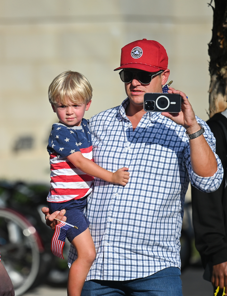 People watch a parade Tuesday, Sept. 3, 2024 to honor UTC student and Olympic Gold medalist Olivia Reeves.