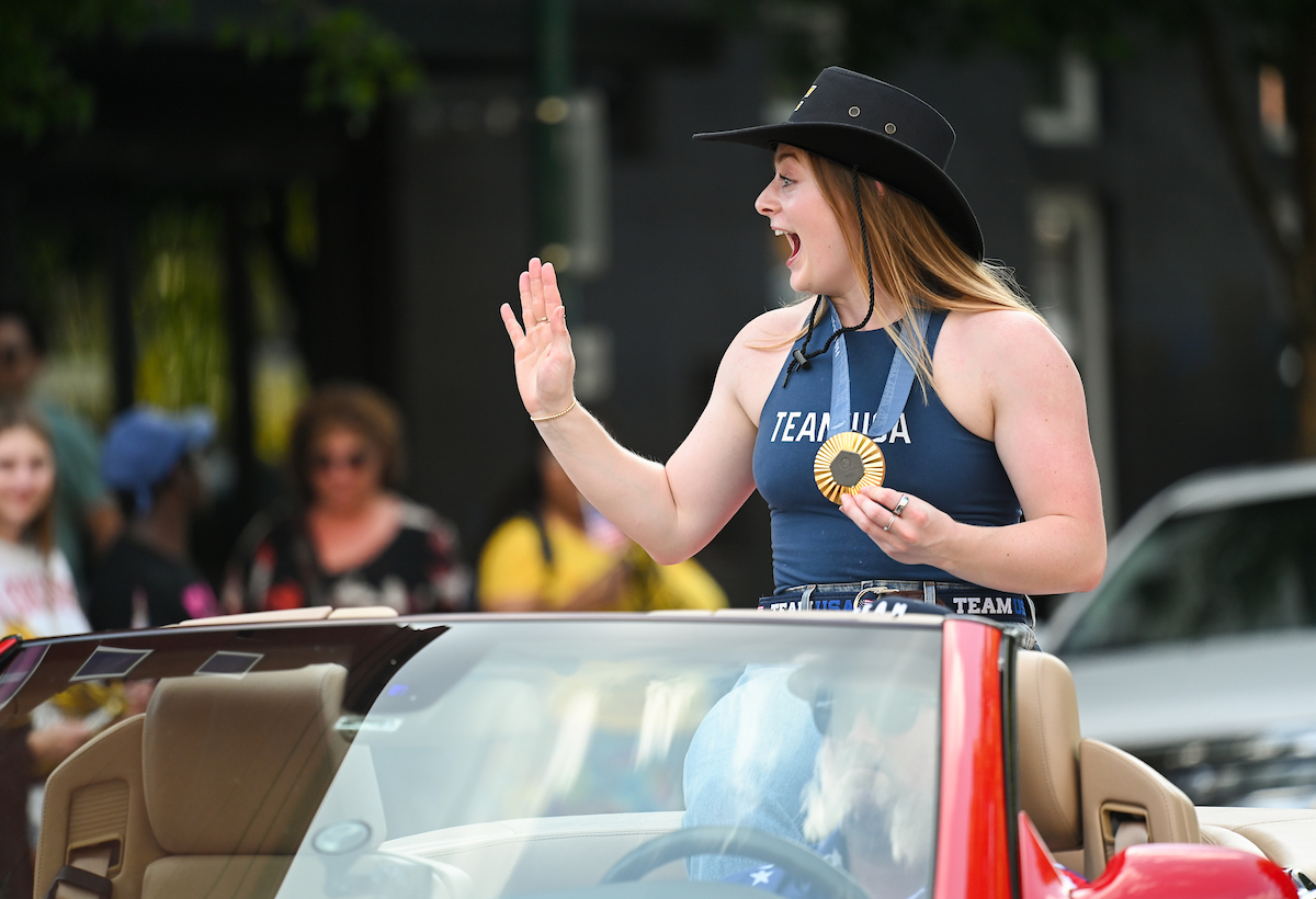People watch a parade Tuesday, Sept. 3, 2024 to honor UTC student and Olympic Gold medalist Olivia Reeves.