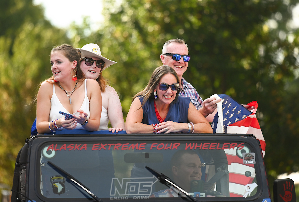 People watch a parade Tuesday, Sept. 3, 2024 to honor UTC student and Olympic Gold medalist Olivia Reeves.