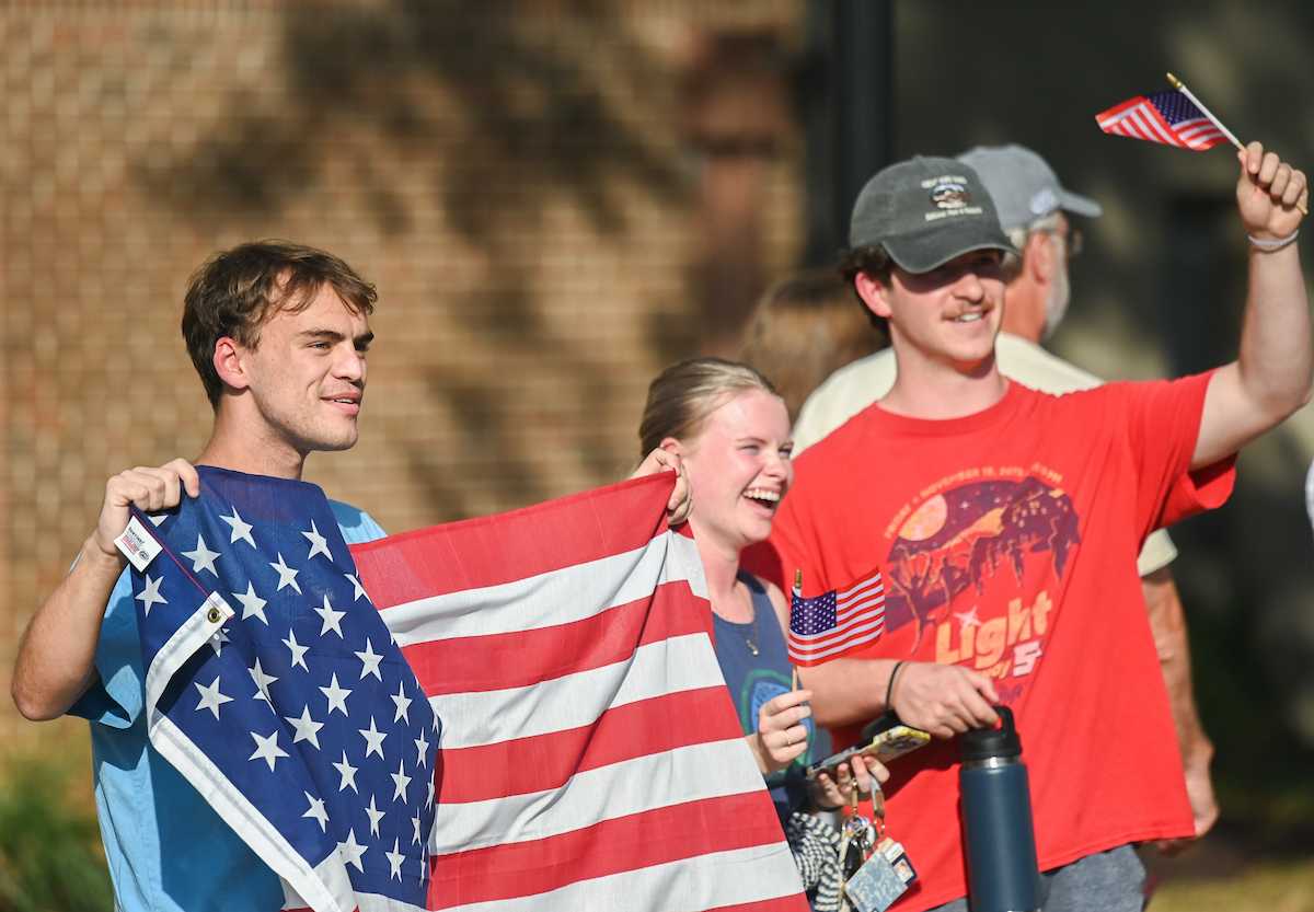 People watch a parade Tuesday, Sept. 3, 2024 to honor UTC student and Olympic Gold medalist Olivia Reeves.