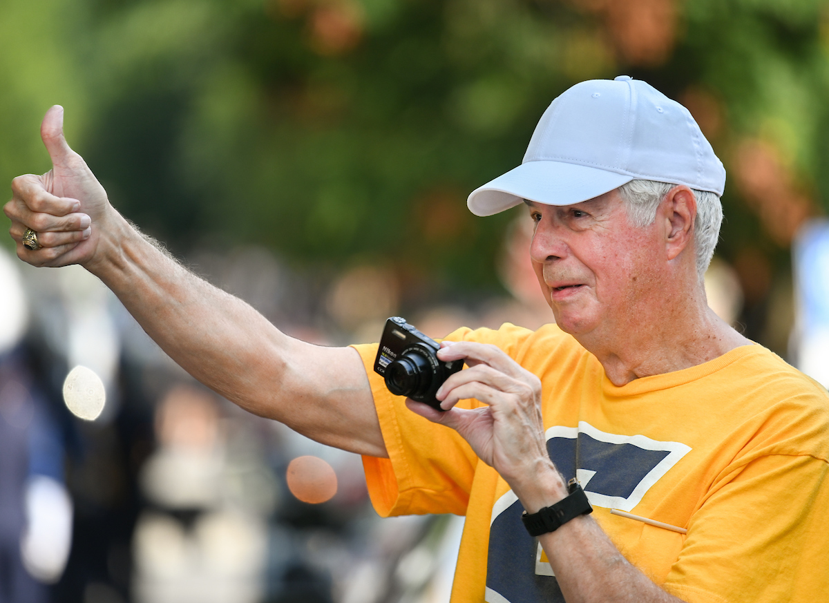 People watch a parade Tuesday, Sept. 3, 2024 to honor UTC student and Olympic Gold medalist Olivia Reeves.