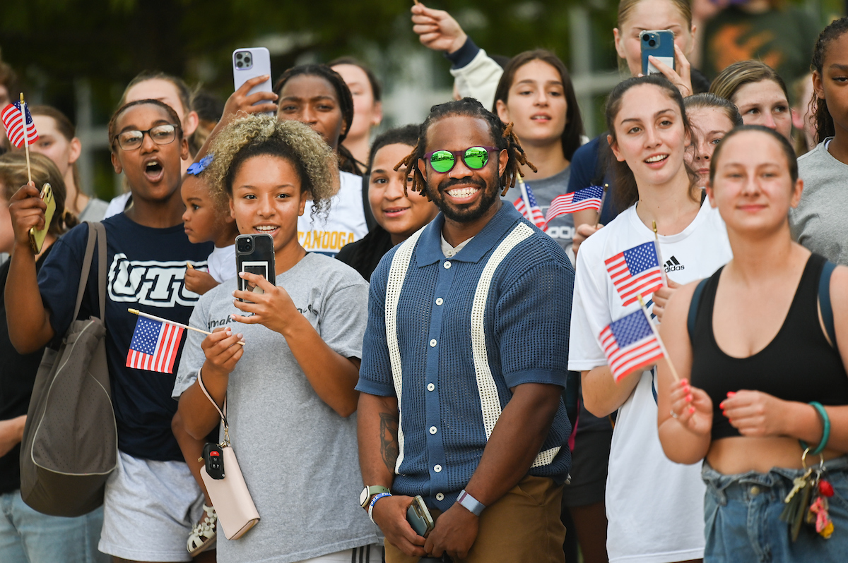 People watch a parade Tuesday, Sept. 3, 2024 to honor UTC student and Olympic Gold medalist Olivia Reeves.