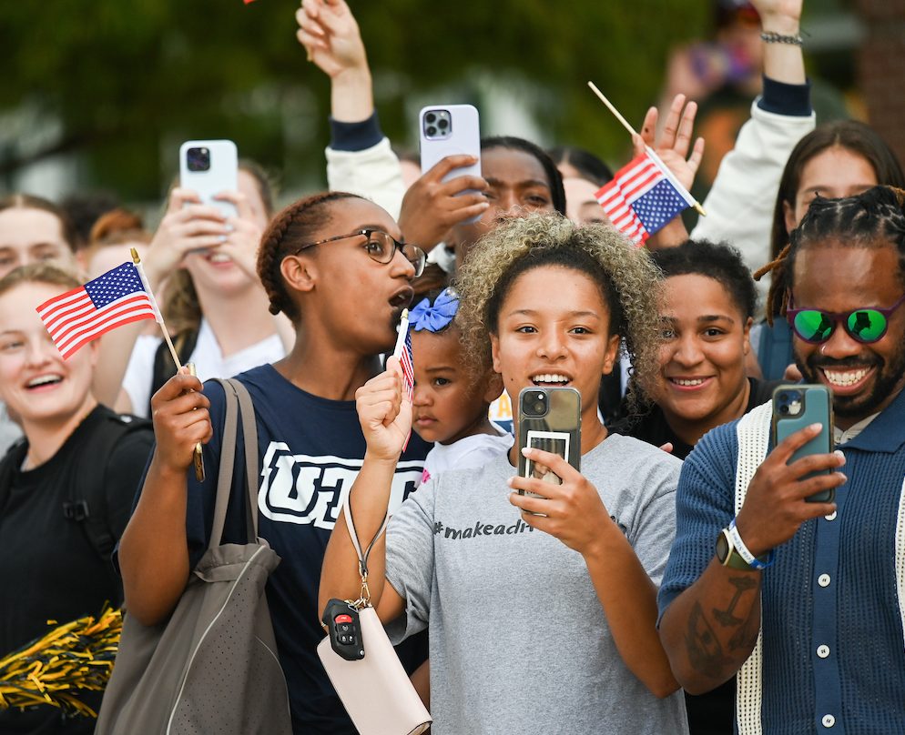 People watch a parade Tuesday, Sept. 3, 2024 to honor UTC student and Olympic Gold medalist Olivia Reeves.