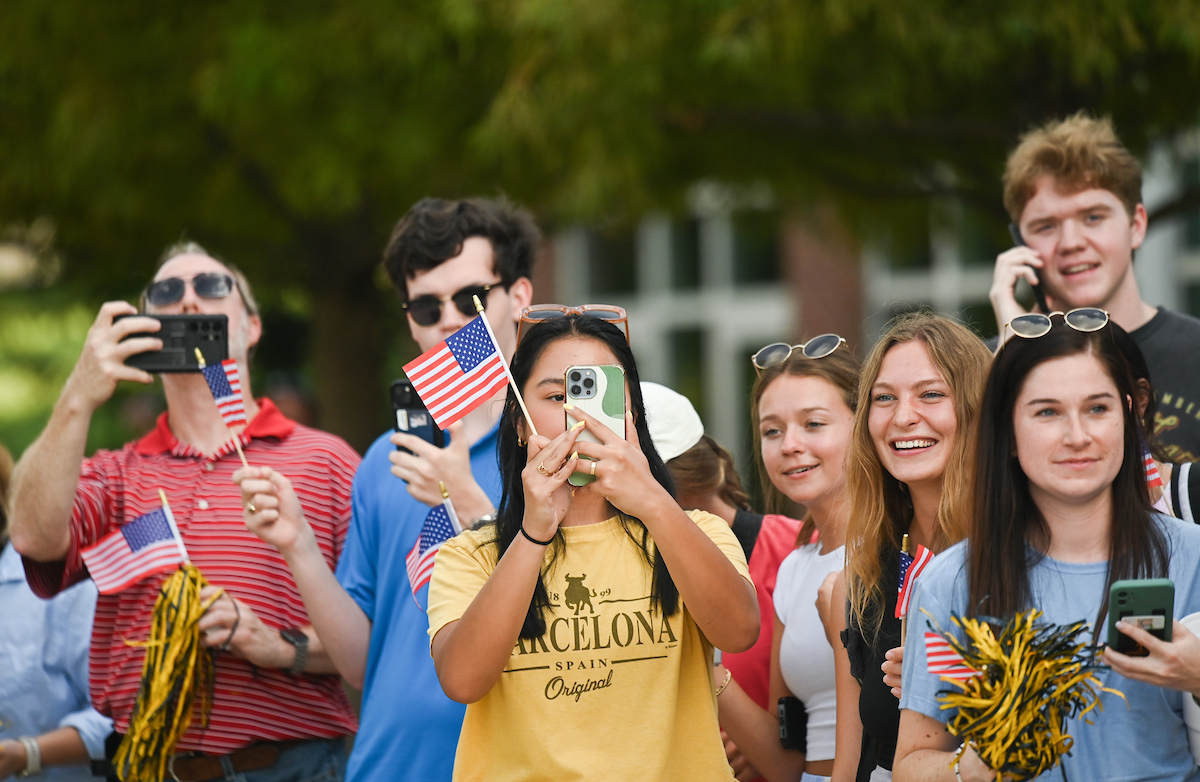 People watch a parade Tuesday, Sept. 3, 2024 to honor UTC student and Olympic Gold medalist Olivia Reeves.