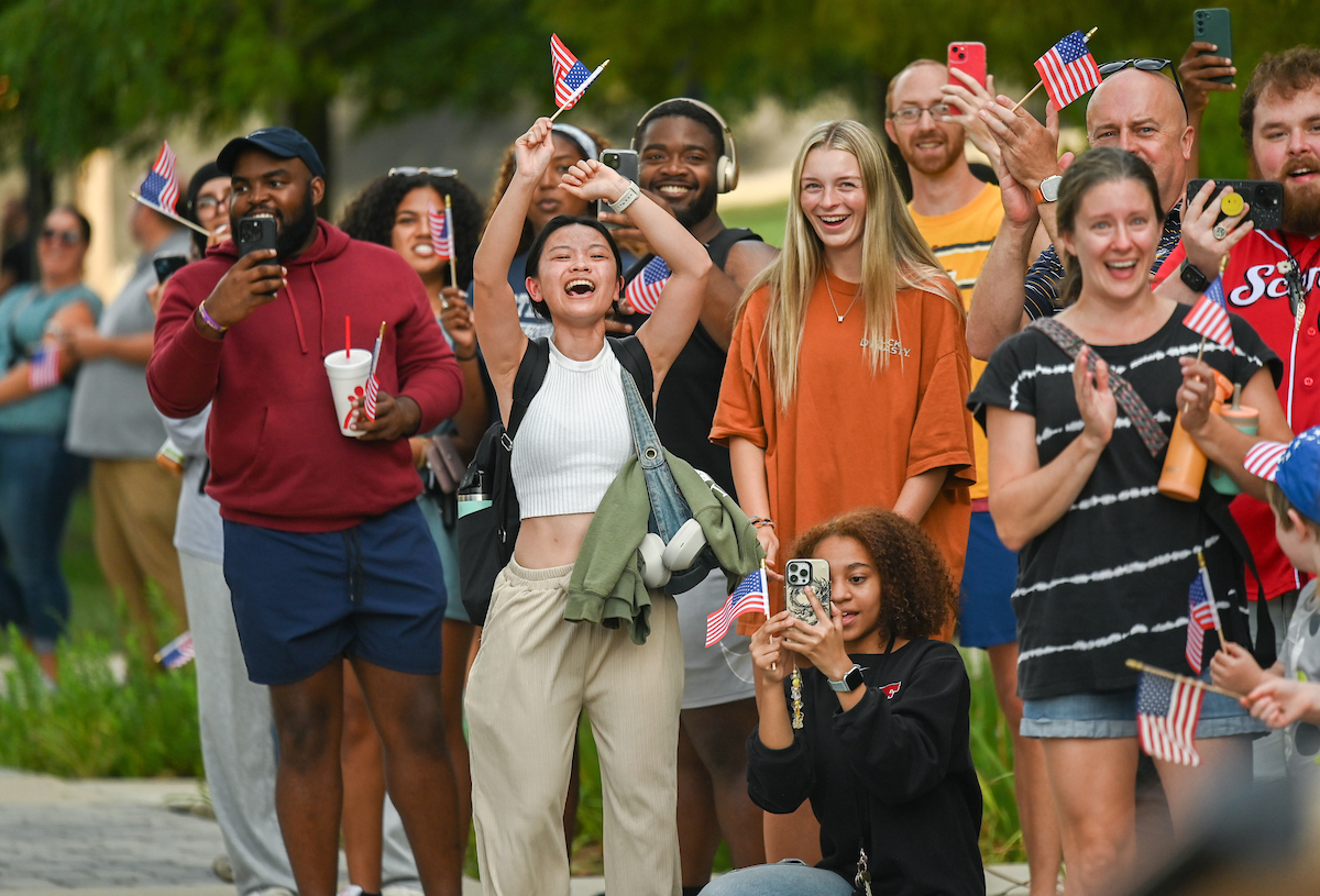 People watch a parade Tuesday, Sept. 3, 2024 to honor UTC student and Olympic Gold medalist Olivia Reeves.