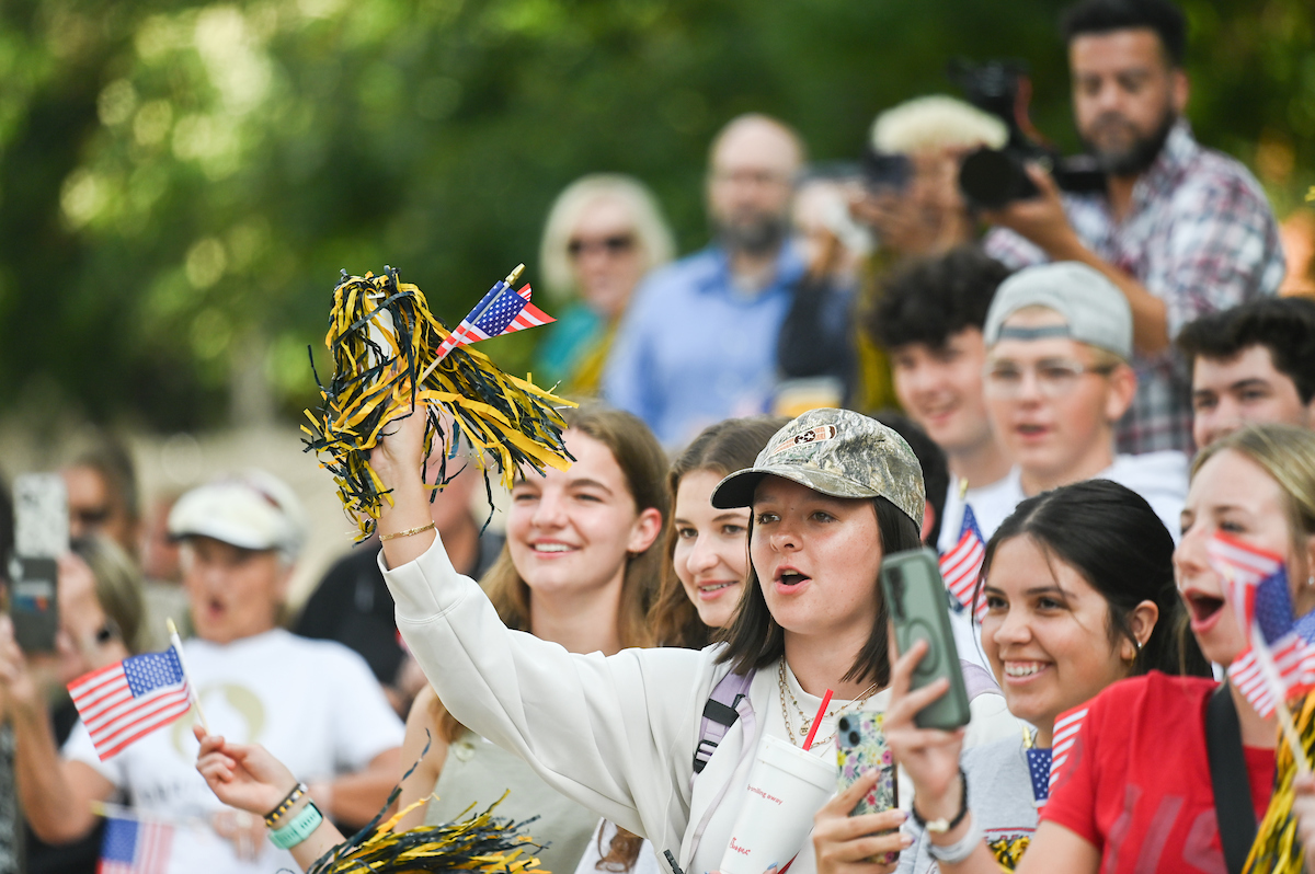 People watch a parade Tuesday, Sept. 3, 2024 to honor UTC student and Olympic Gold medalist Olivia Reeves.
