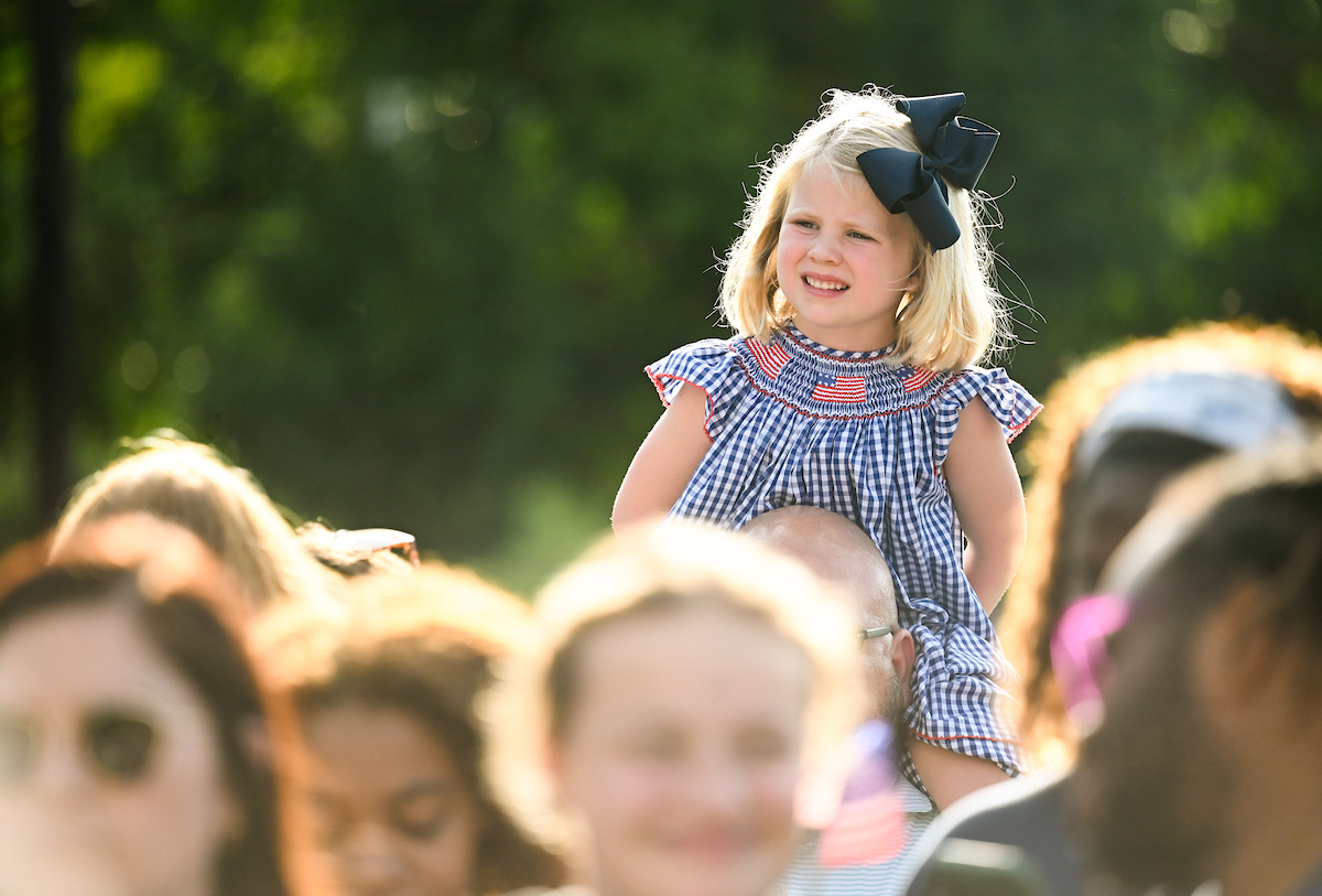 People watch a parade Tuesday, Sept. 3, 2024 to honor UTC student and Olympic Gold medalist Olivia Reeves.