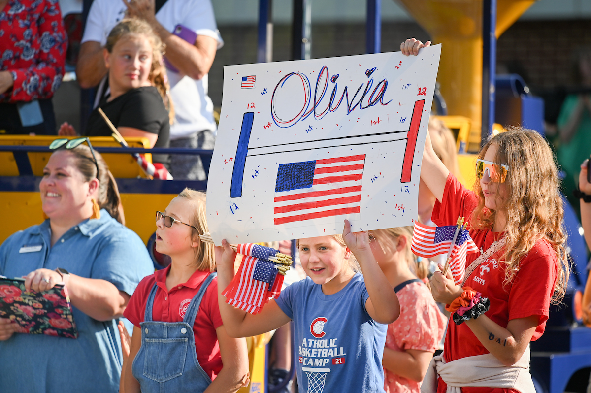 People watch a parade Tuesday, Sept. 3, 2024 to honor UTC student and Olympic Gold medalist Olivia Reeves.