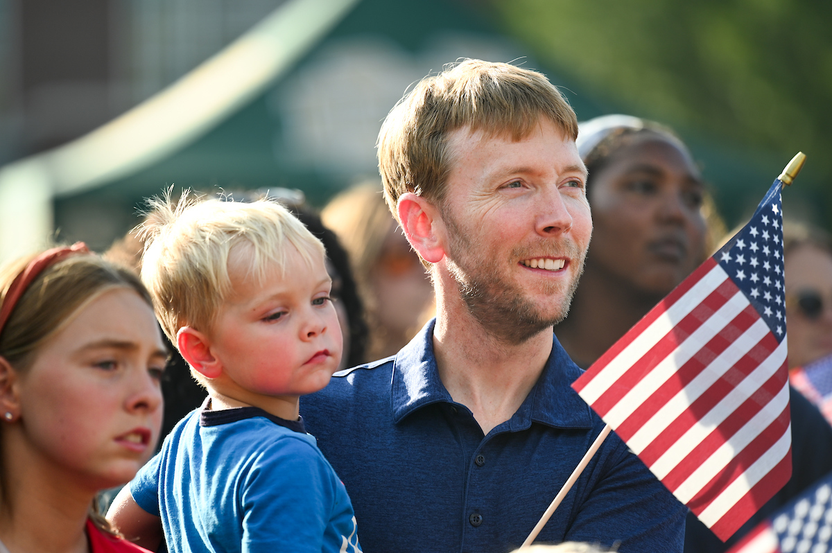 People watch a parade Tuesday, Sept. 3, 2024 to honor UTC student and Olympic Gold medalist Olivia Reeves.