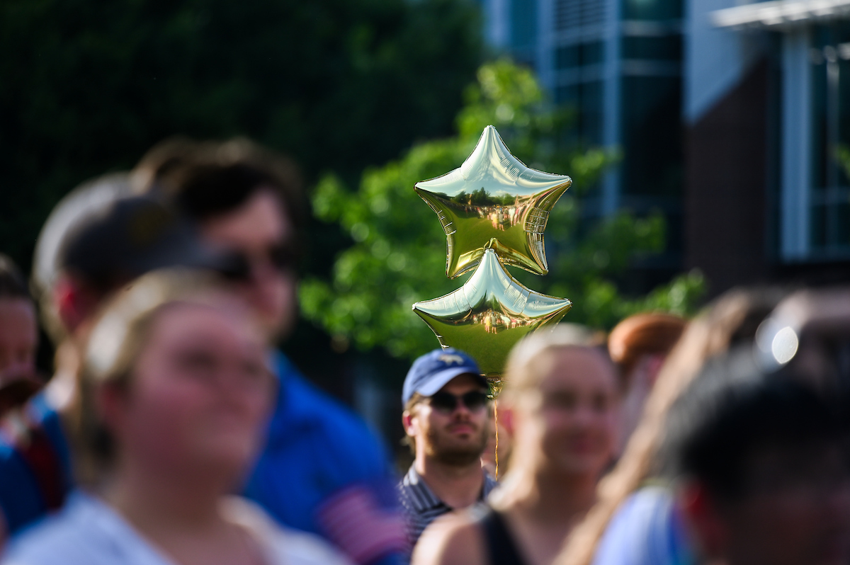 People watch a parade Tuesday, Sept. 3, 2024 to honor UTC student and Olympic Gold medalist Olivia Reeves.
