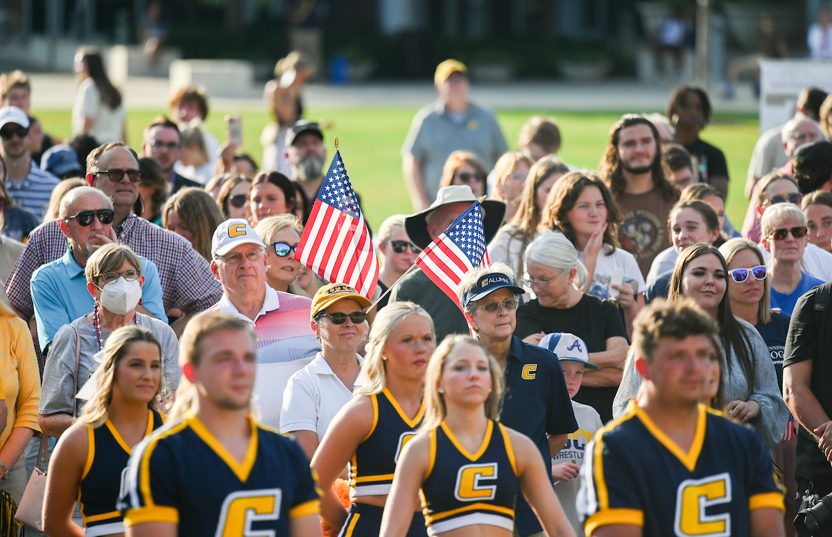 People watch a parade Tuesday, Sept. 3, 2024 to honor UTC student and Olympic Gold medalist Olivia Reeves.