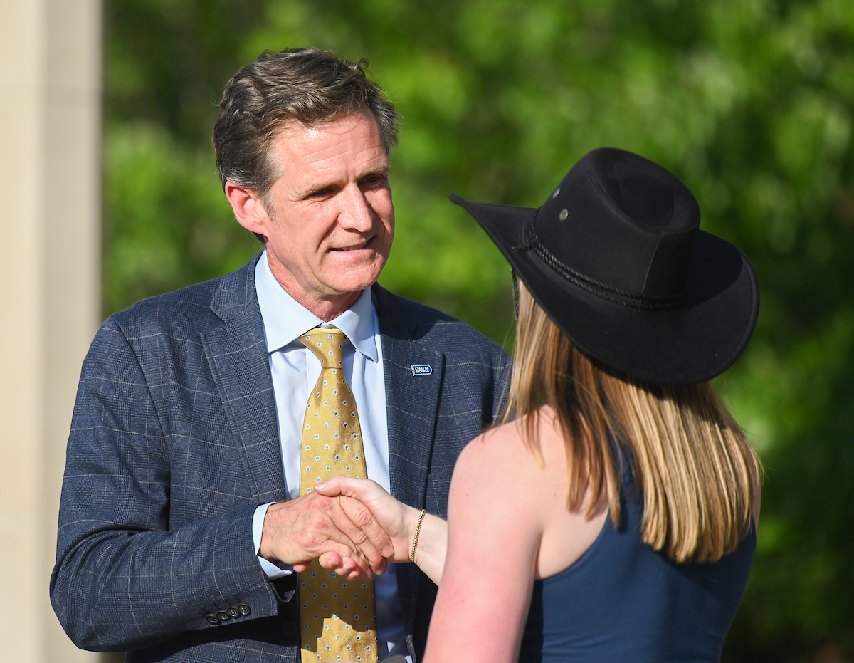 People watch a parade Tuesday, Sept. 3, 2024 to honor UTC student and Olympic Gold medalist Olivia Reeves.