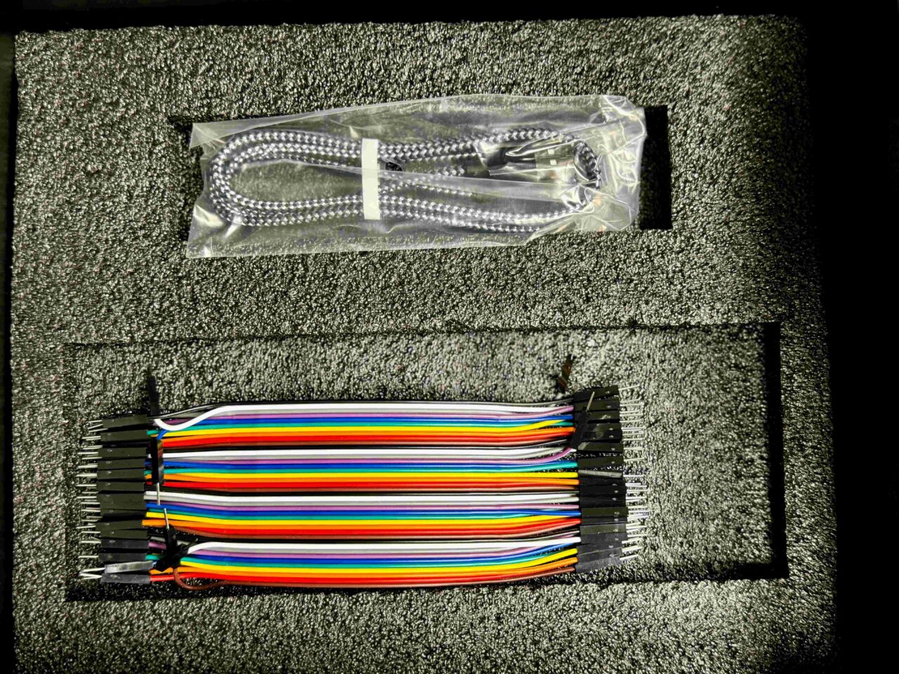 Wiring for connecting the DigiLab One logic board to a student-designed computer circuit and a cable for connecting to a computer running companion, custom-developed software. Rizwaan Abdulkadir researched and found suppliers and manufacturers (in China) to source these items, including the packaging enclosing them, as well as their assembly into complete kits and shipping from China to the U.S.