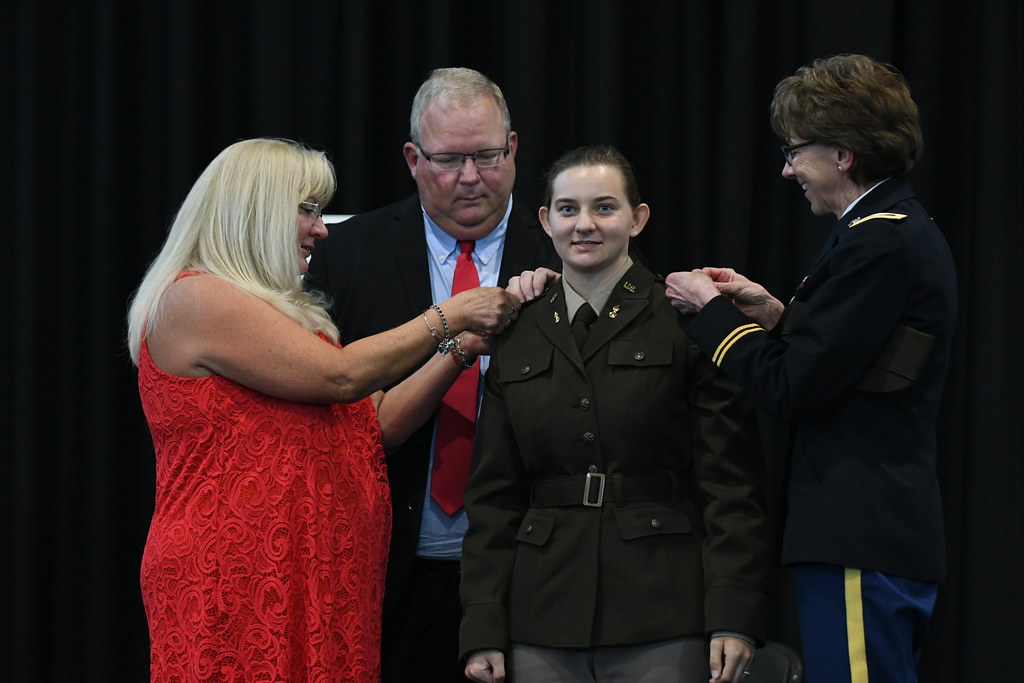 Erin Lunt's commissioning ceremony pinning: From left, her mom, Agnes Lunt; her dad, Sam Lunt; and her aunt, Col. Marsha Lunt, retired. Photo courtesy of Stetson University.