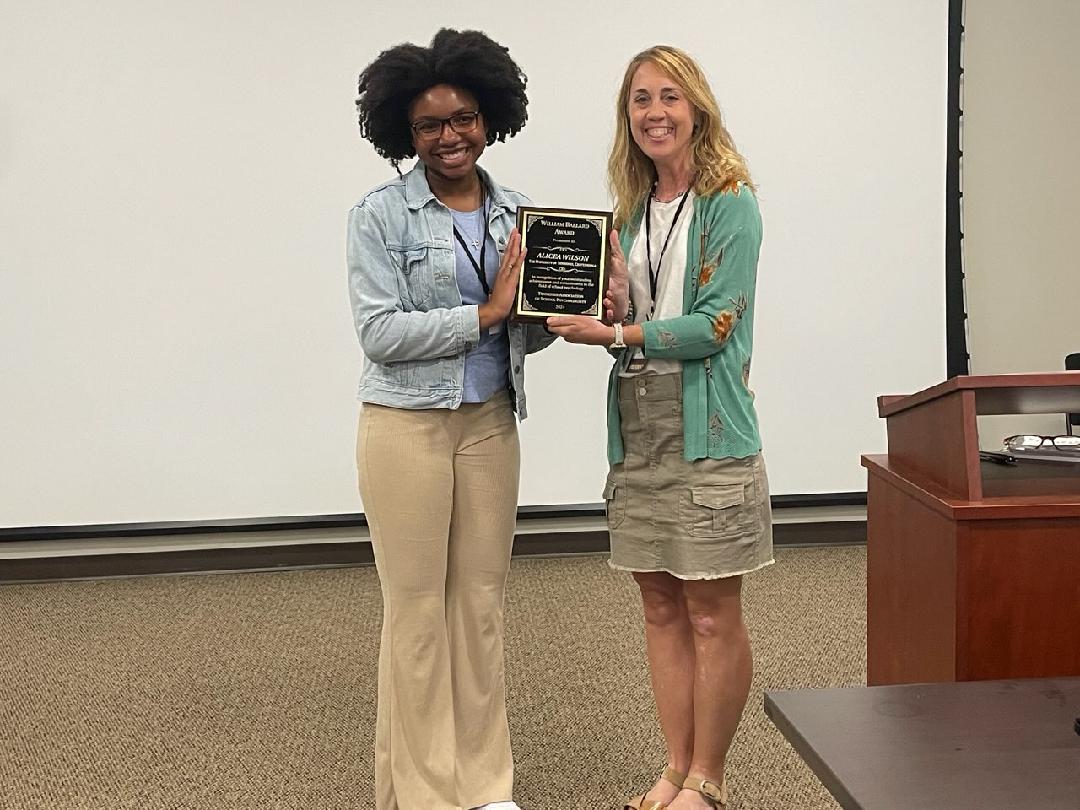 Alicea Wilson (left) and Tennessee Association of School Psychologists President Pam Haggard pose with the William Ballard Award. Photo courtesy of Amanda Hardin.