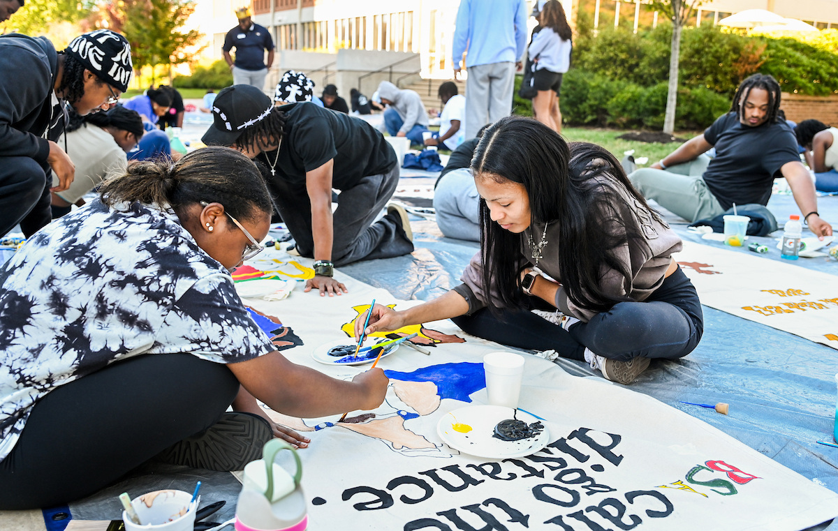 Homecoming Banner painting, Sunday, Oct. 20th, 2024 on Vine Street.
