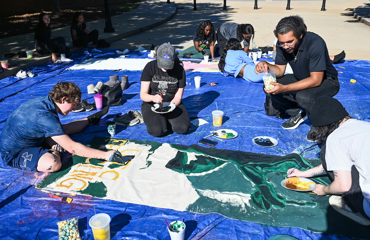 Homecoming Banner painting, Sunday, Oct. 20th, 2024 on Vine Street.