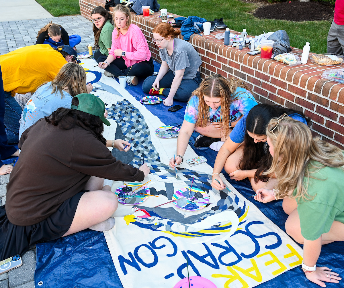 Homecoming Banner painting, Sunday, Oct. 20th, 2024 on Vine Street.